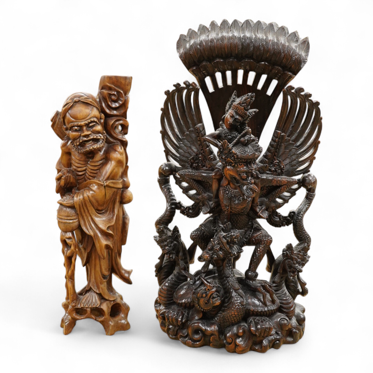 A large Indonesian hardwood Garuda group and a Chinese hardwood figure of a Luohan, largest 61cm high